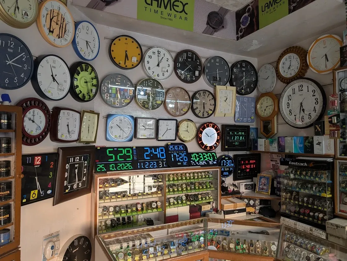 Inside Jay Santoshi Watch: wall clocks, digital LED clocks, and Sonata, Fastrack and Lamex watch displays